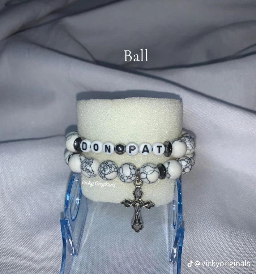 Dainty beaded earrings sparkling under light